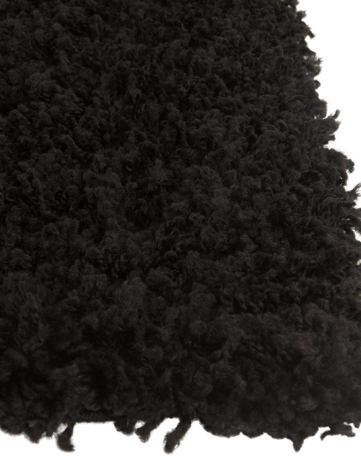 Quadratisch Hochflorteppich Solid Shag in Tiefschwarz von Hadorn™ - Lifestyle Image