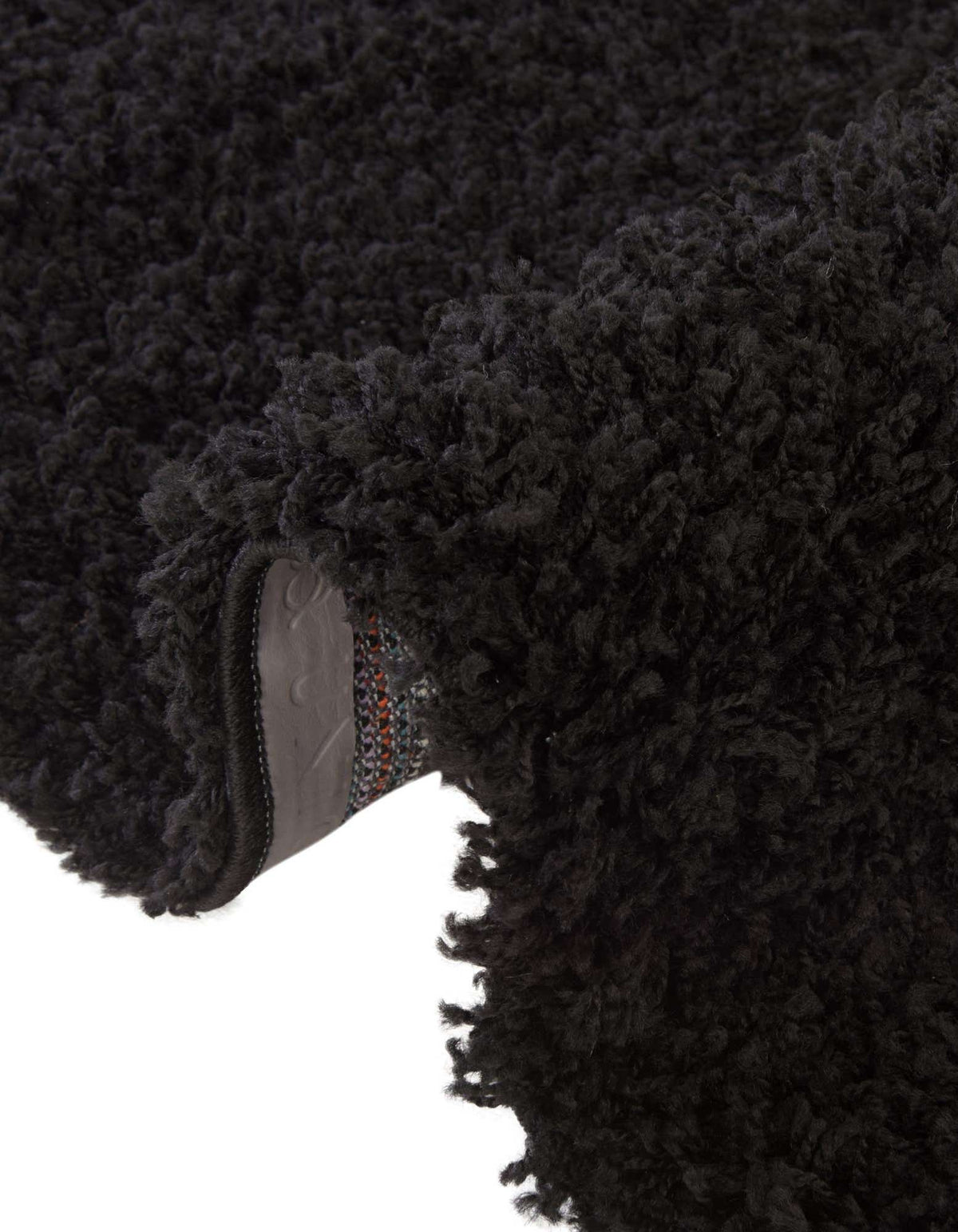 Quadratisch Hochflorteppich Solid Shag in Tiefschwarz von Hadorn™ - Lifestyle Image