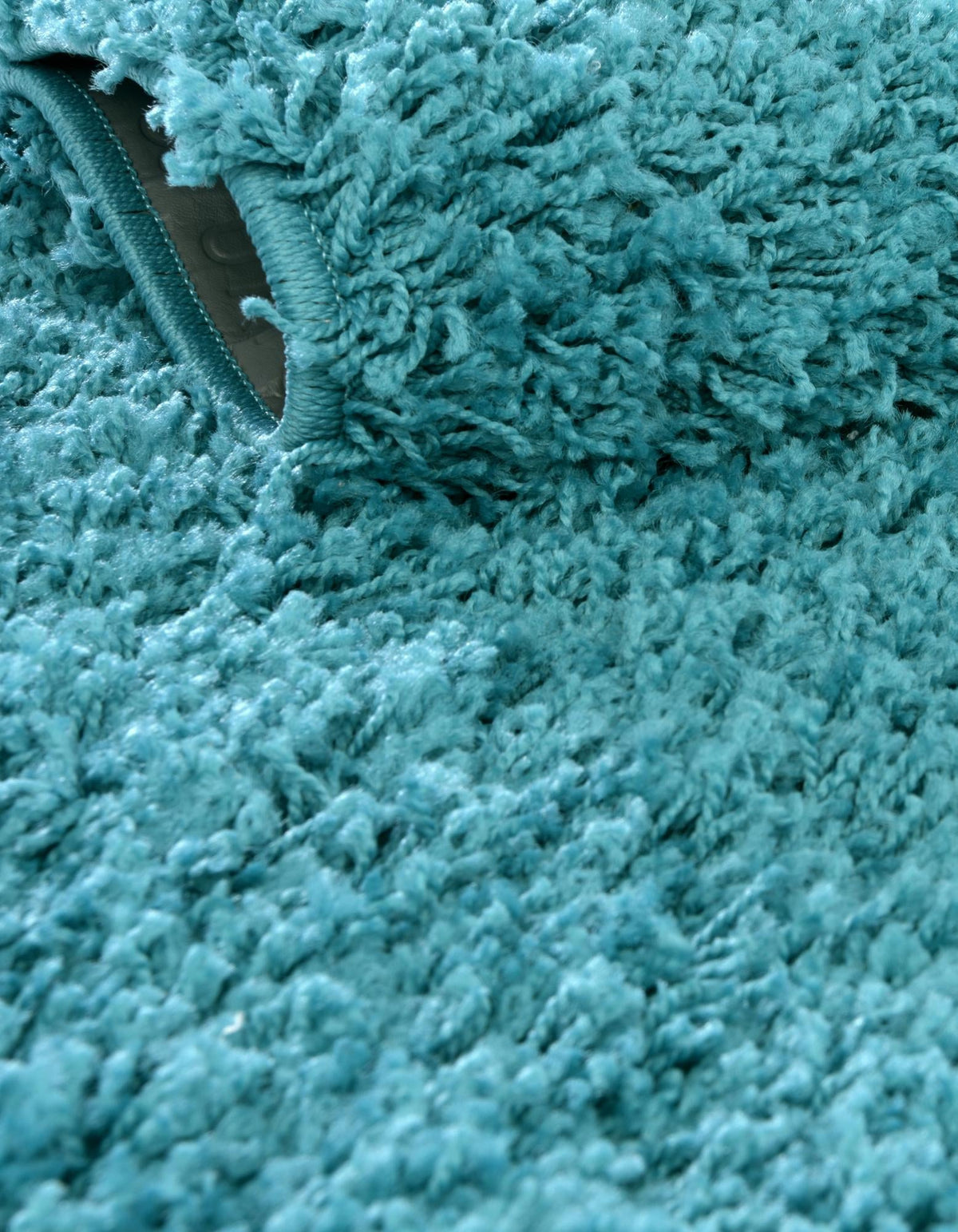 Rund Hochflorteppich Solid Shag in Dunkelblau von Hadorn™ - Lifestyle Image