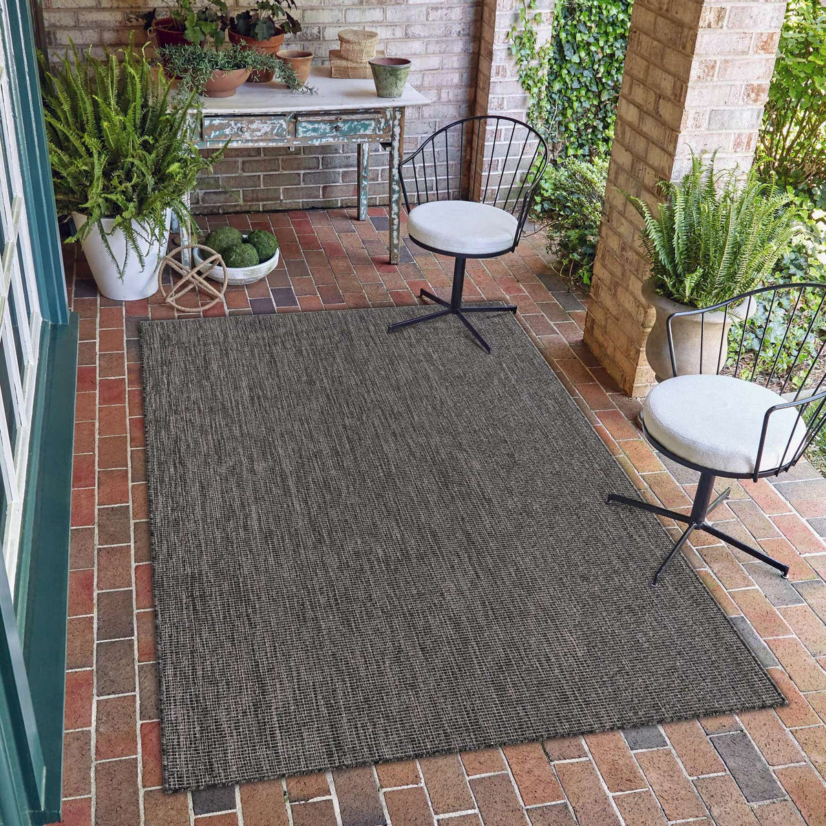Rechteck Outdoor Teppich Tulum Outdoor in Schwarz von Hadorn™ - Lifestyle Image