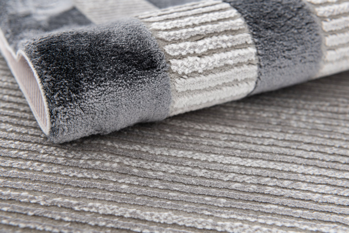 Rund Luxus Teppich Chiasso in Grau von Hadorn™ - Lifestyle Image