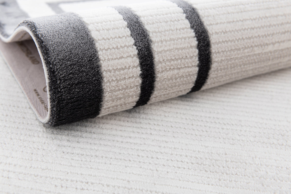 Rund Luxus Teppich Chiasso in Grau von Hadorn™ - Lifestyle Image