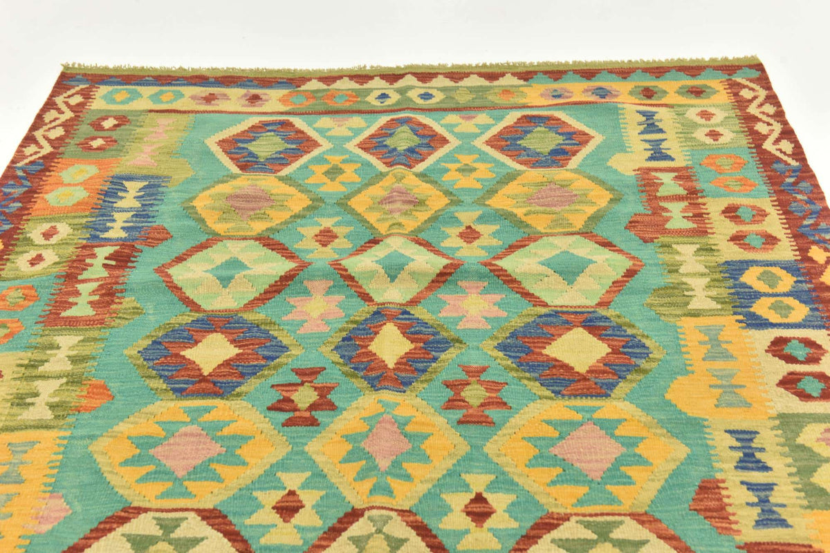 Rechteck Handgeflochten Teppich Kelim Maymana in Grün von Hadorn™ - Lifestyle Image
