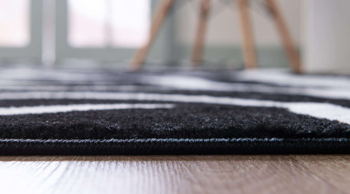 Rechteck Teppich Safari in Schwarz von Hadorn™ - Lifestyle Image