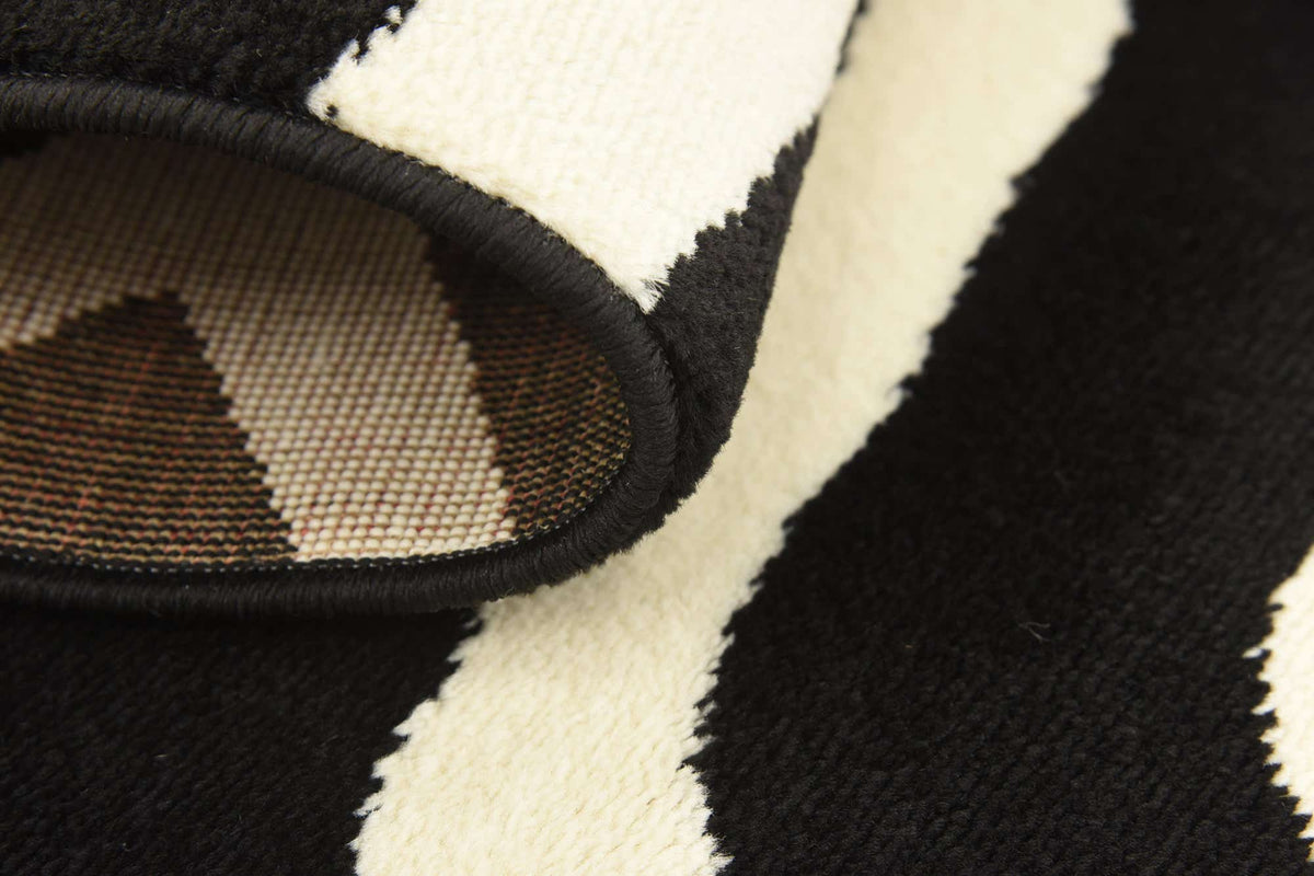 Rechteck Teppich Safari in Schwarz von Hadorn™ - Lifestyle Image