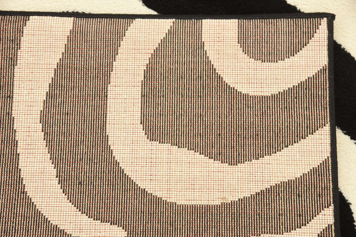 Rechteck Teppich Safari in Schwarz von Hadorn™ - Lifestyle Image