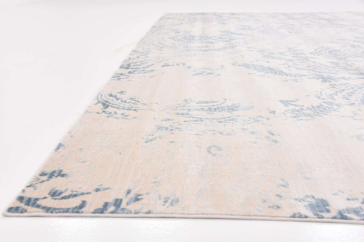 Rechteck Teppich Restoration in Blau von Hadorn™ - Lifestyle Image