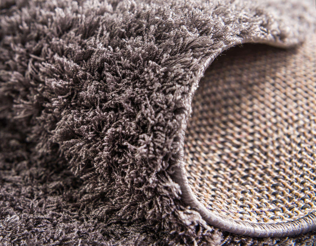 Rechteck Hochflorteppich Studio Solid Shag in Dunkelgrau von Hadorn™ - Lifestyle Image