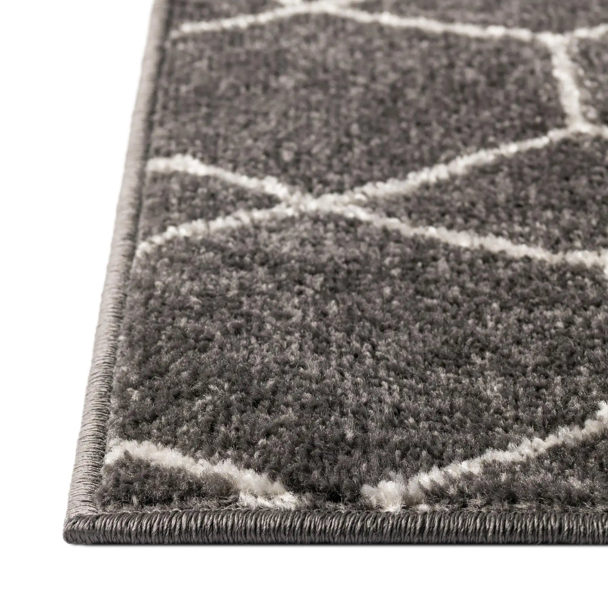Rechteck Teppich Trellis Frieze in Dunkelgrau von Hadorn™ - Lifestyle Image