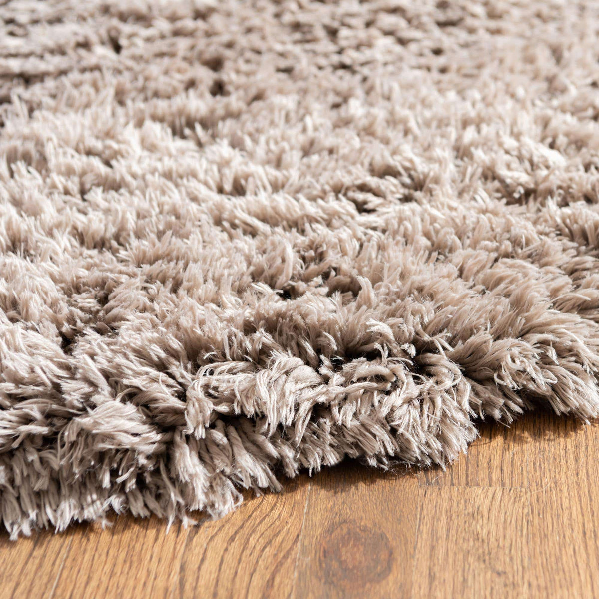 Rund Hochflorteppich Infinity Shag in Grau von Hadorn™ - Lifestyle Image