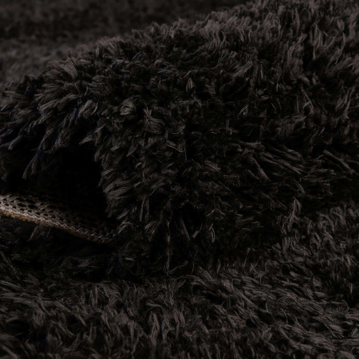 Rechteck Hochflorteppich Infinity Shag in Schwarz von Hadorn™ - Lifestyle Image