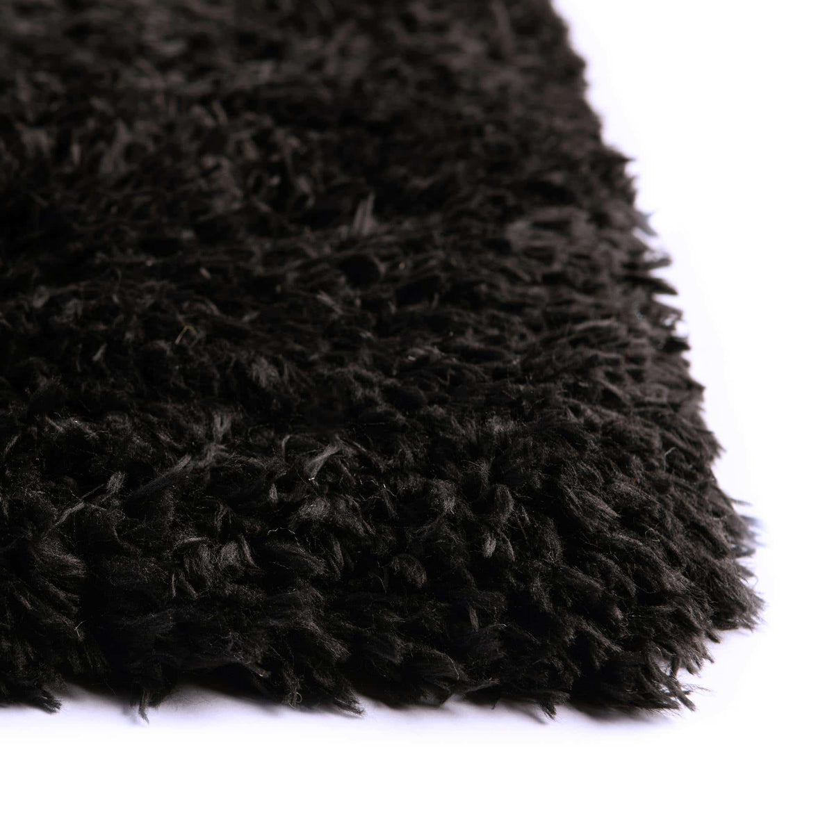 Rechteck Hochflorteppich Infinity Shag in Schwarz von Hadorn™ - Lifestyle Image