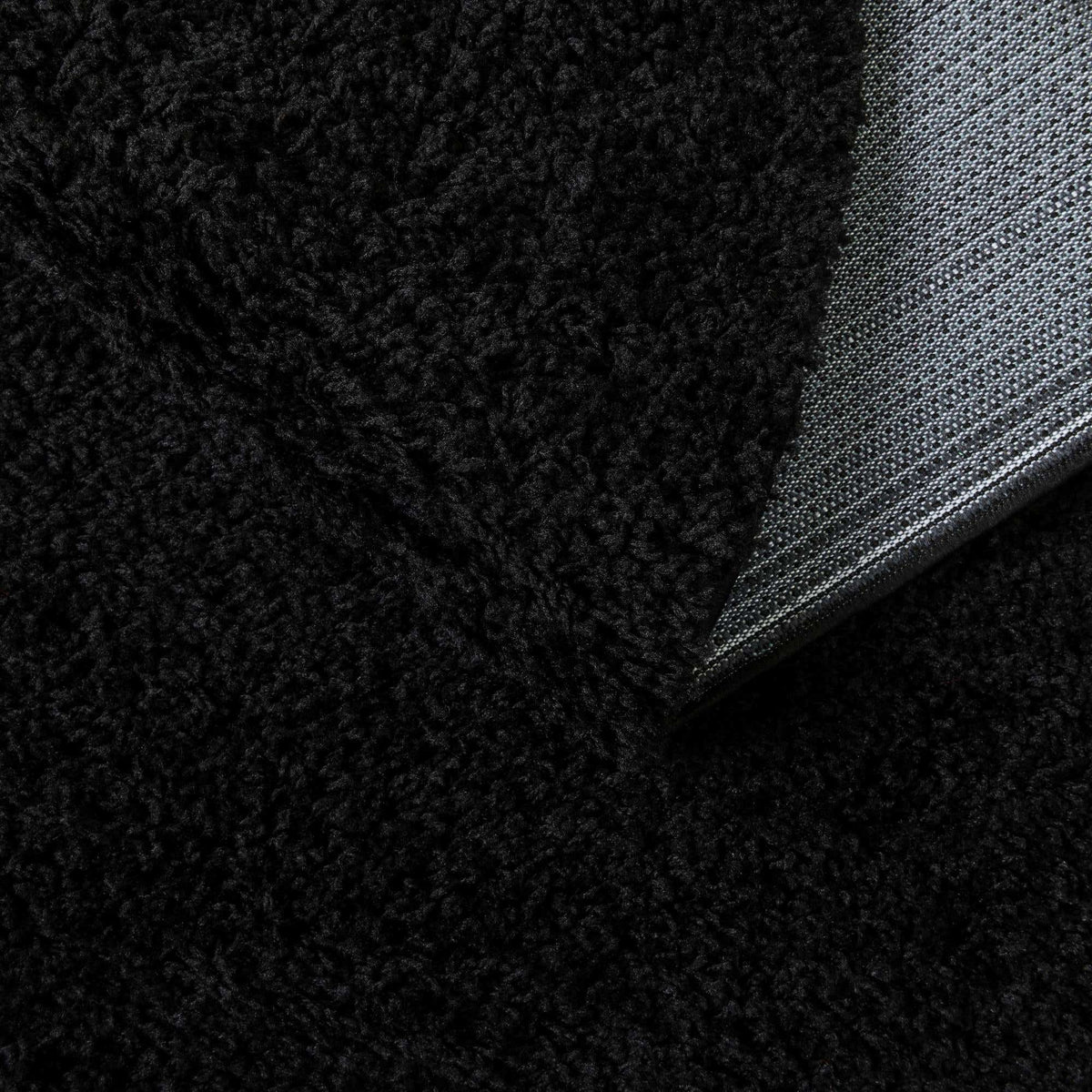 Rund Hochflorteppich Everyday Shag in Schwarz von Hadorn™ - Lifestyle Image