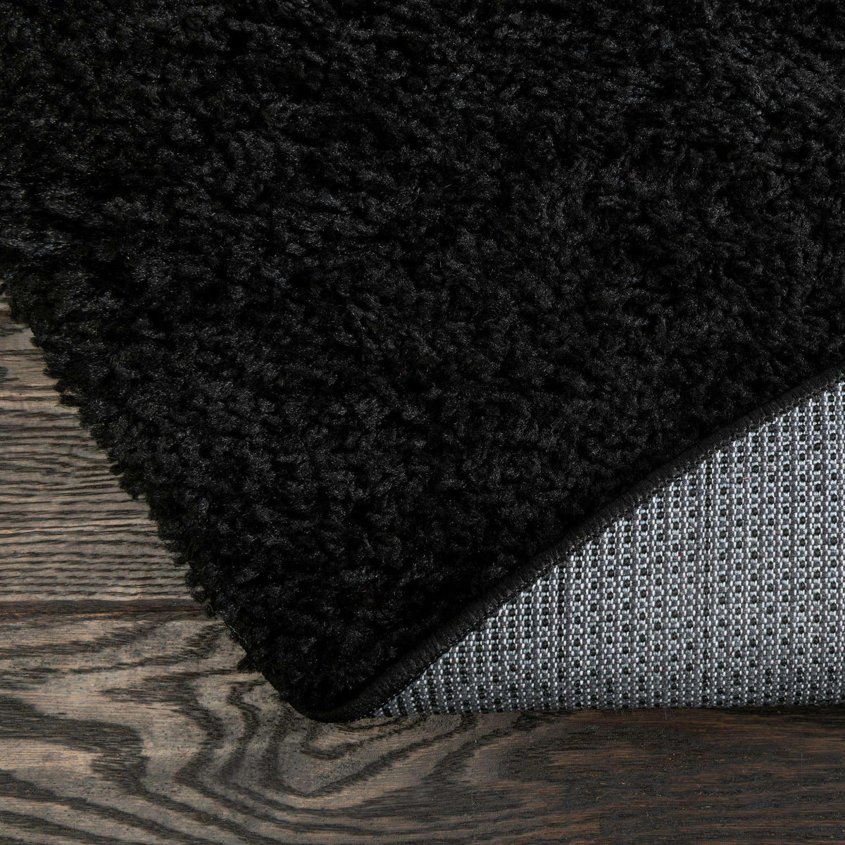 Rund Hochflorteppich Everyday Shag in Schwarz von Hadorn™ - Lifestyle Image