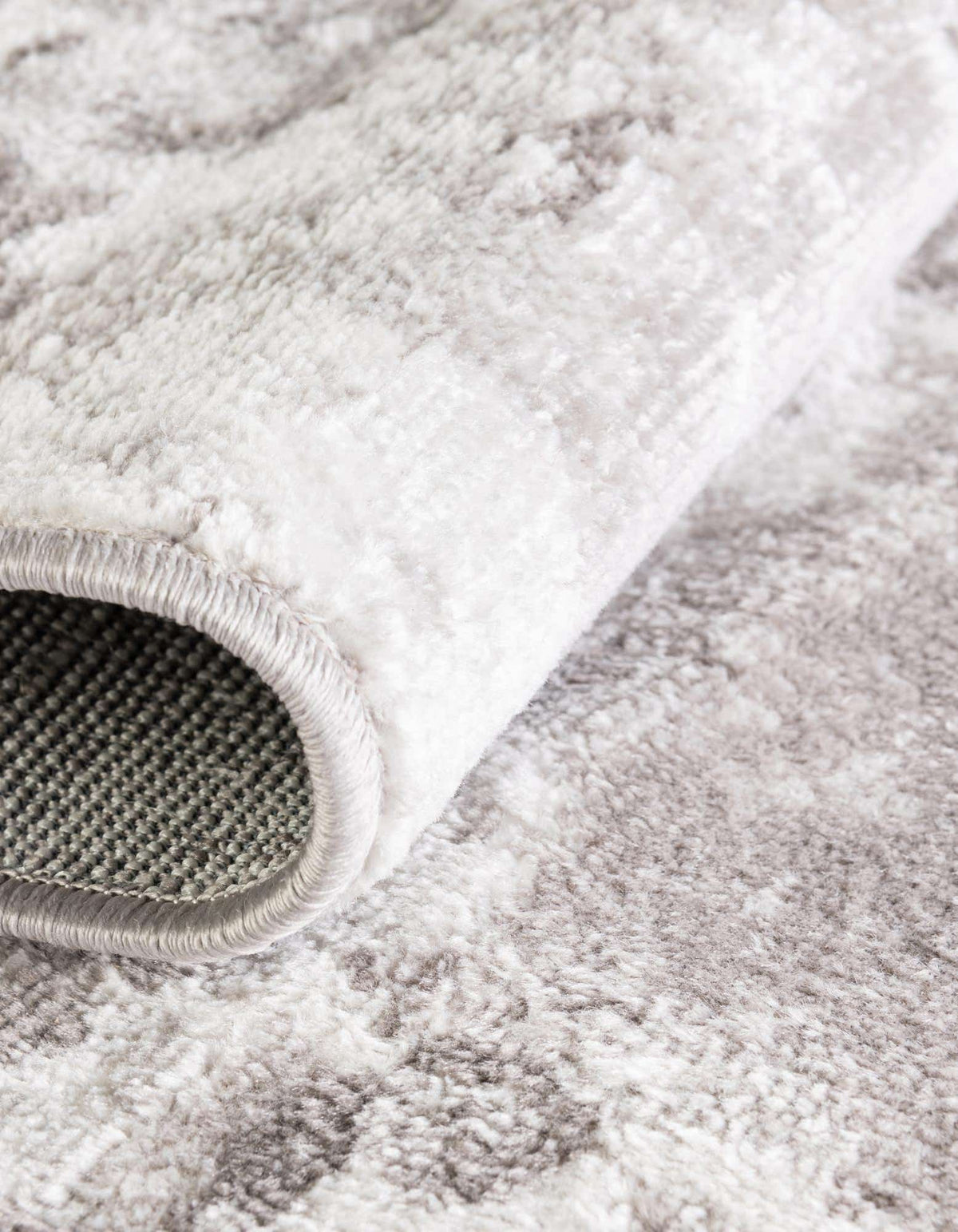 Rund Teppich Aurora in Steingrau von Hadorn™ - Lifestyle Image